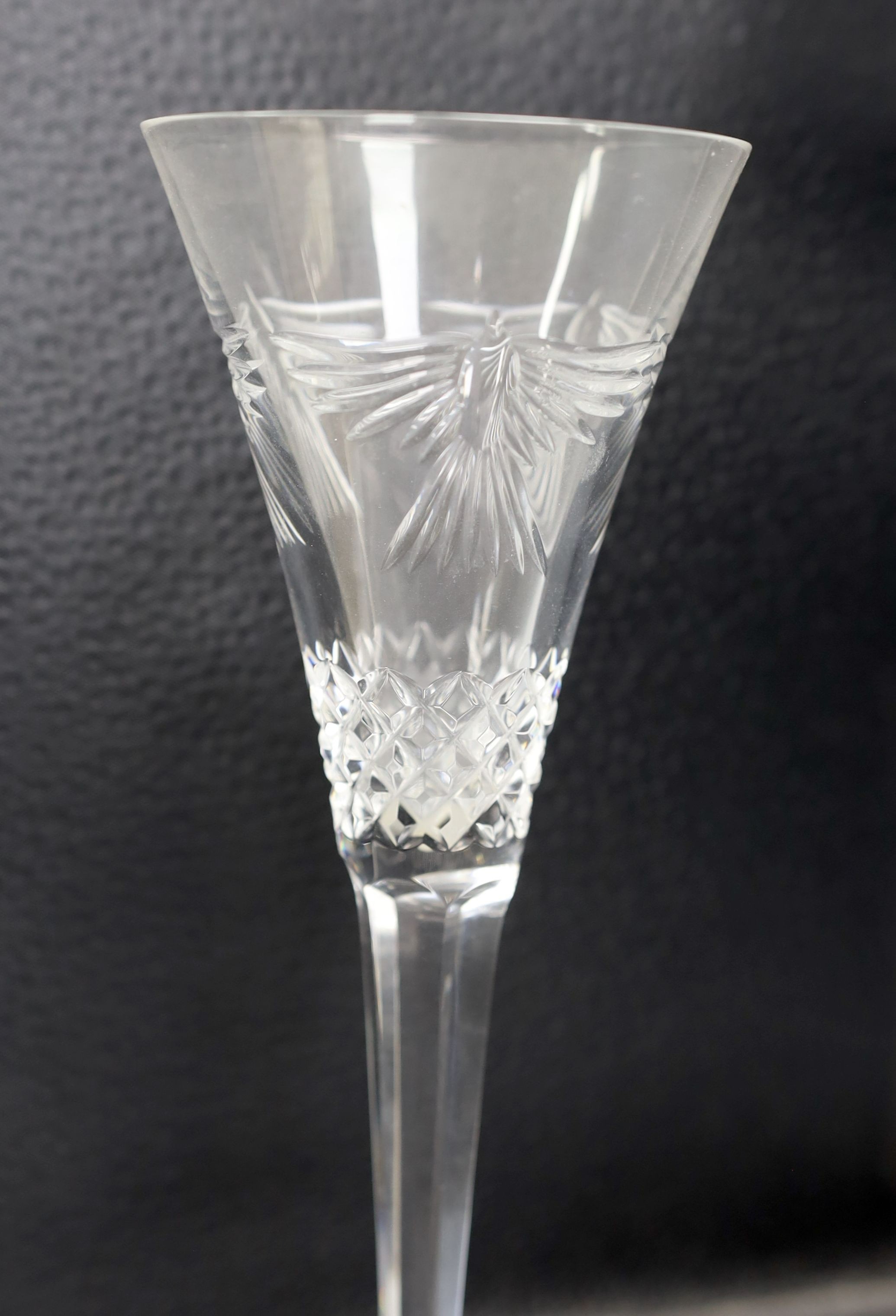 Seven Waterford Millennium collection cut glass wine flutes - 23.5cm tall